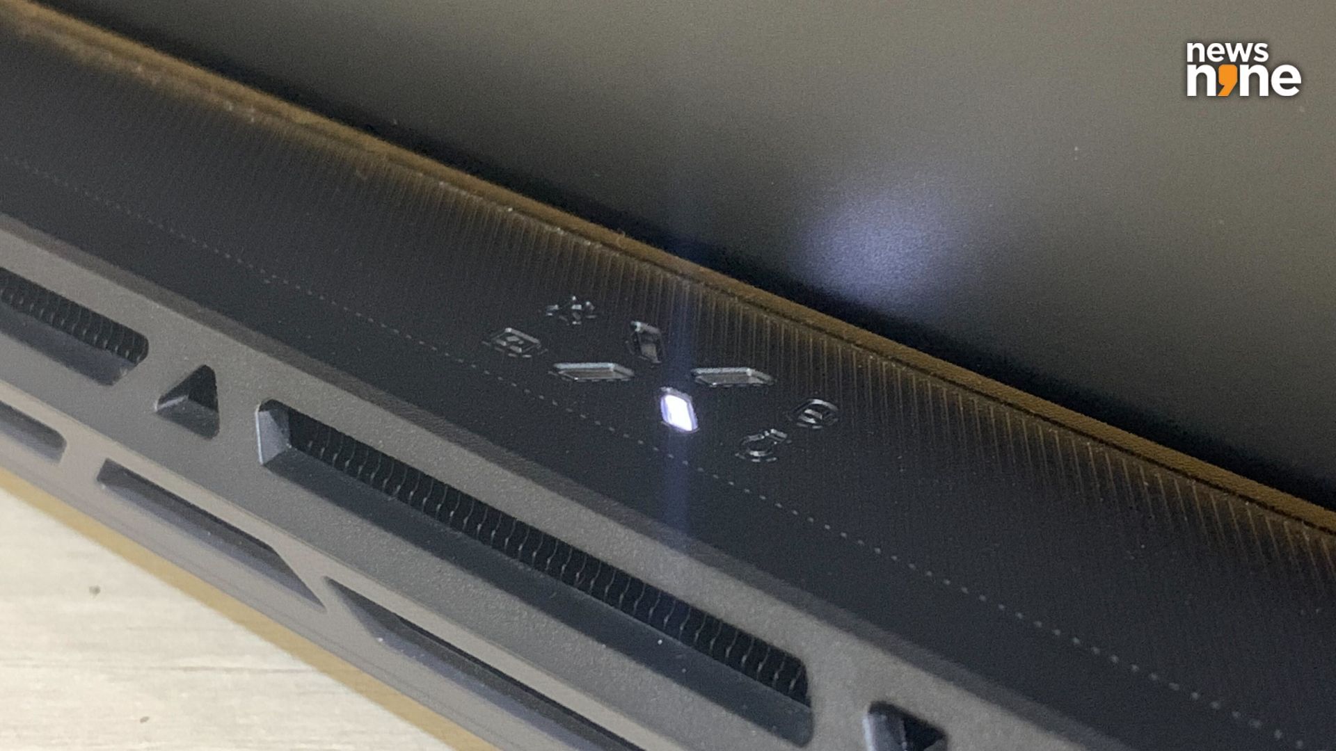 The indicators at the back tell you at a glance what the laptop is up to. (Image Credit: Aditya Madanapalle/News9).