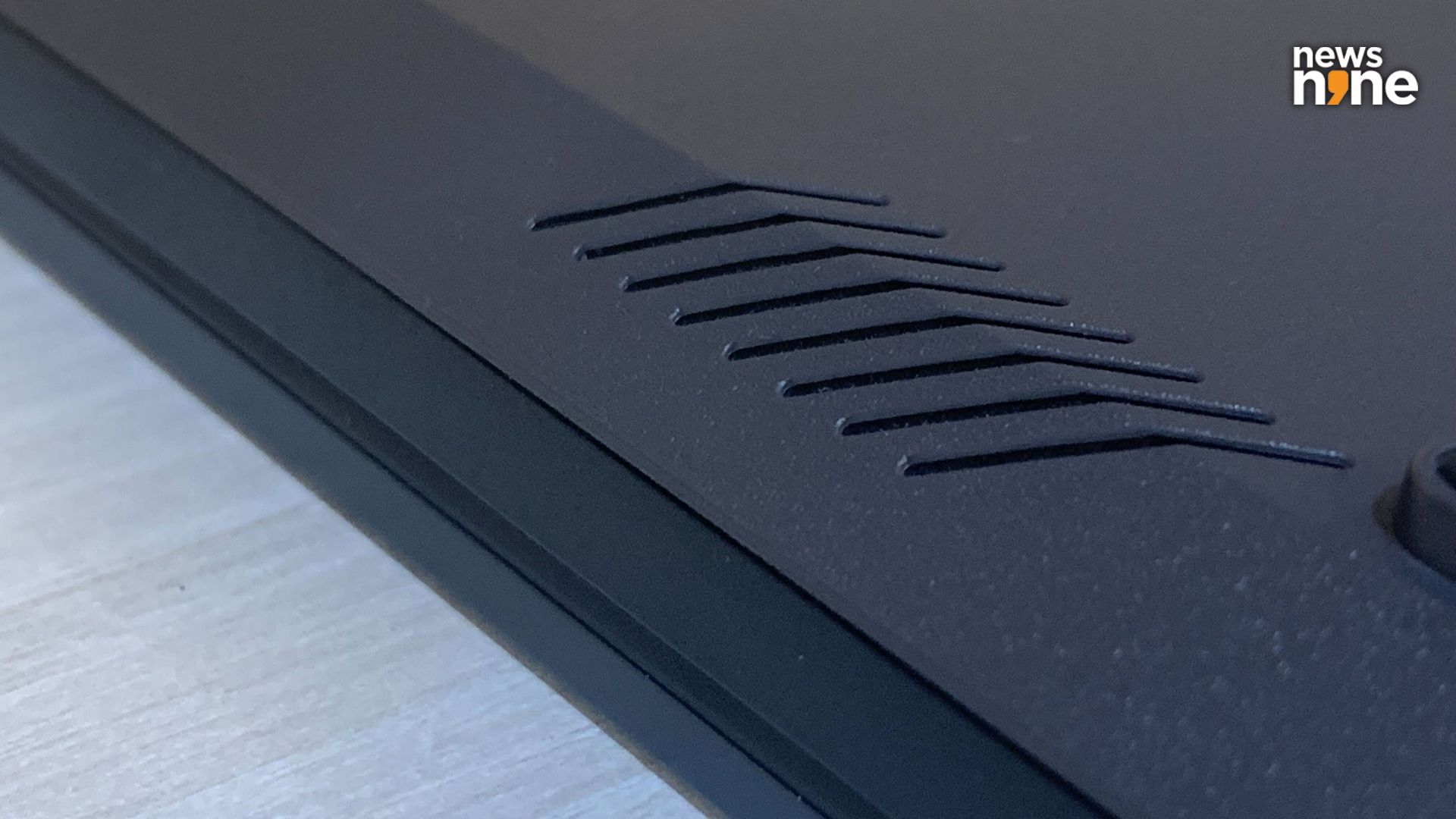 The speaker grilles are positioned sideways on the edge. (Image Credit: Aditya Madanapalle/News9).