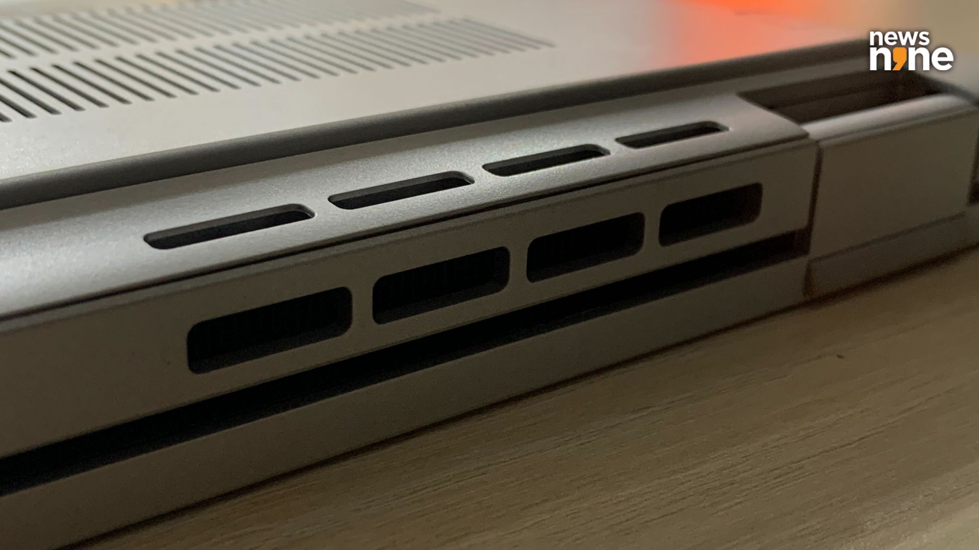 The rear vents are partially pushed to the base. This is one of the few angles that shows the true thickness of the laptop. (Image Credit: Aditya Madanapalle/News9).