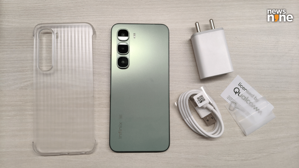 infinix hot 60 5g+ box content. (Image Credit: Pragya Singha Roy/News9)