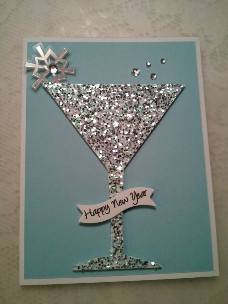 This may contain: a happy new year card with a martini glass