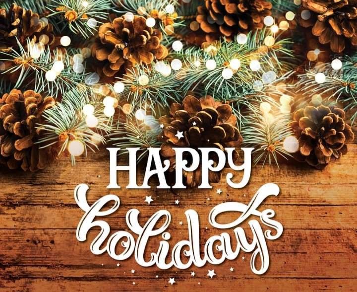 This may contain: a wooden table topped with pine cones and christmas decorations