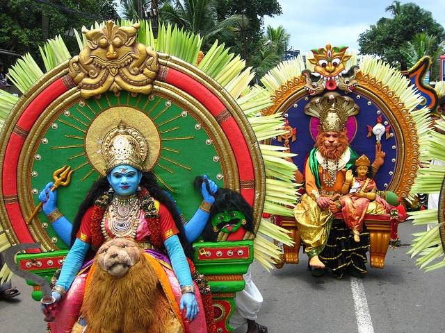 This may contain: some people are dressed up in colorful costumes