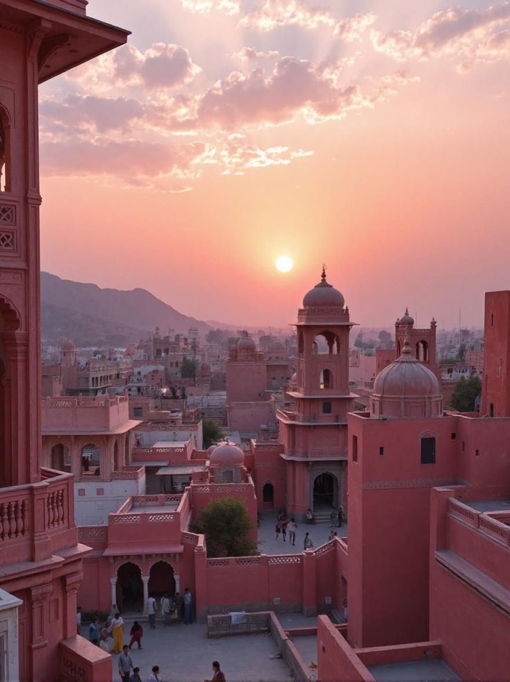 This may contain: the sun is setting over an old city with pink buildings and people walking around it