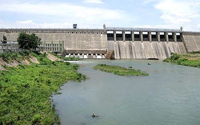 This may contain: there is a large dam on the river