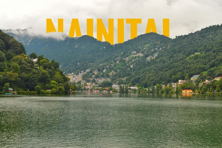 This may contain: a lake with mountains in the background and yellow text over it that says nanita
