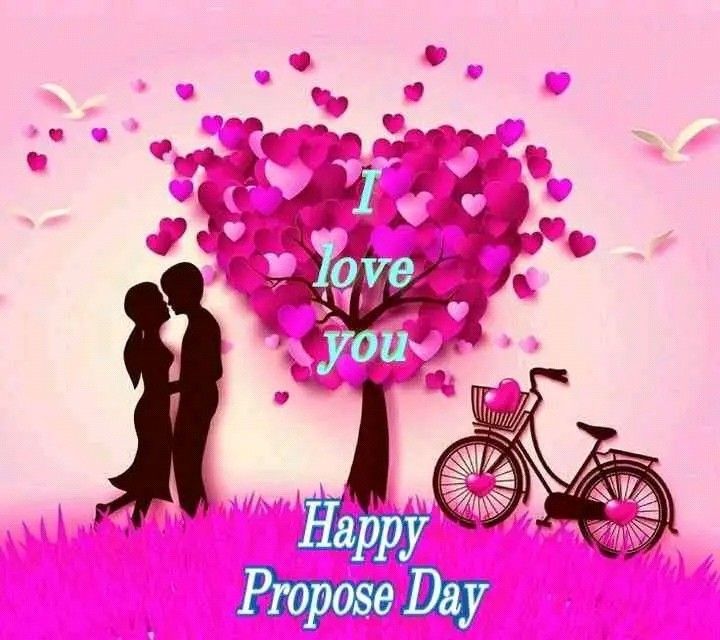 This may contain: a couple kissing in front of a tree with hearts on it and the words i love you