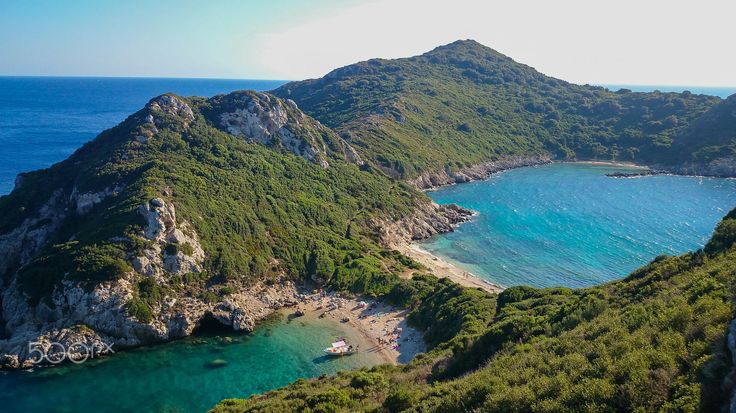 This may contain: an aerial view of the ocean and mountains