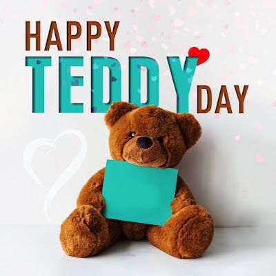 This may contain: a teddy bear holding a piece of paper with the words happy teddy day written on it