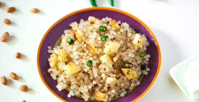 This may contain: a purple plate topped with rice and peas