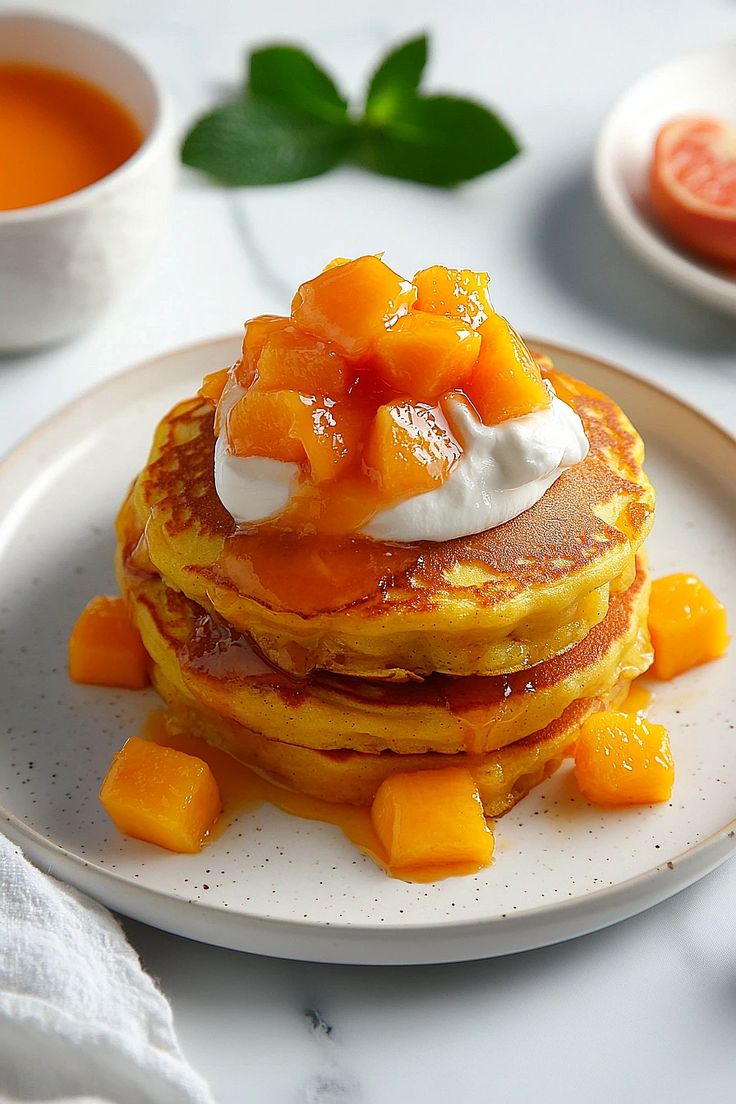 This contains: Image for Fresh Mango Pancakes