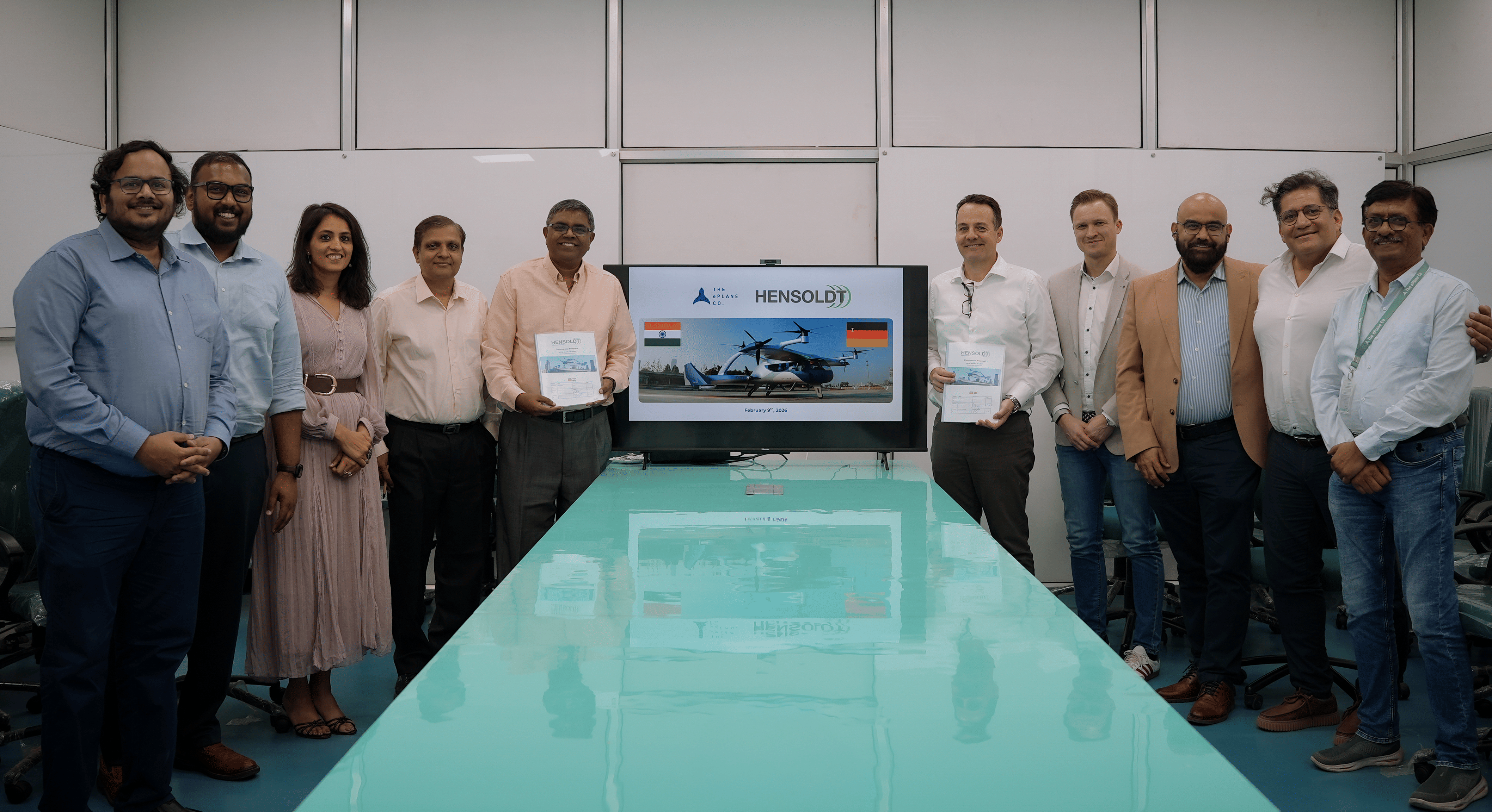 The agreement being signed. (Image Credit: The ePlane Company). 