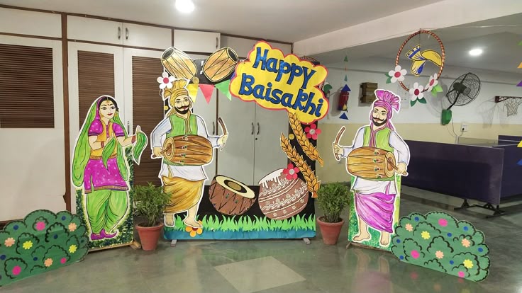 This may contain: a group of people that are standing in front of some paper cut out art pieces