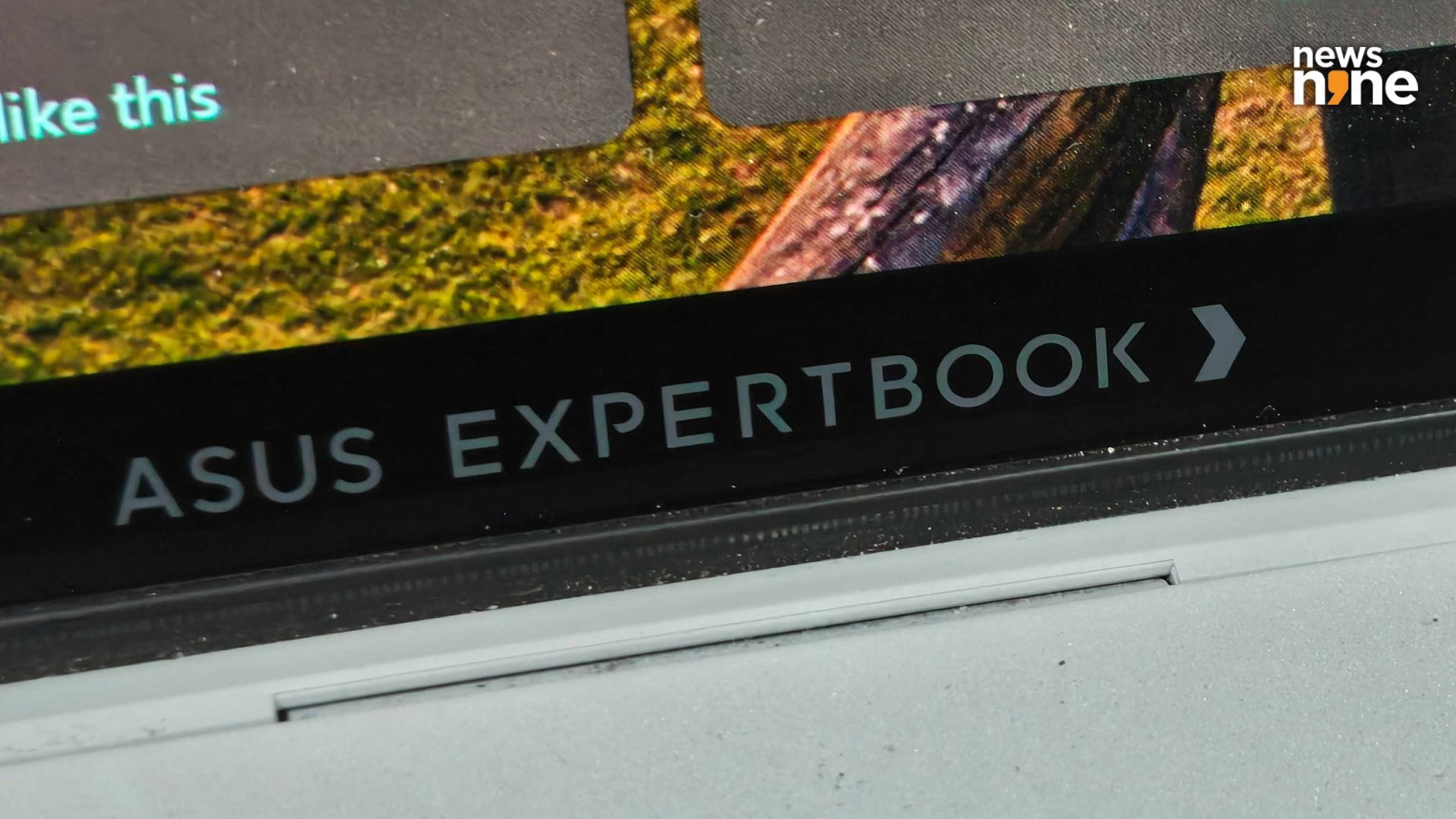 The ExpertBook branding on the display. The LumiLight strip is right below. (Image Credit: Aditya Madanapalle/News9). 