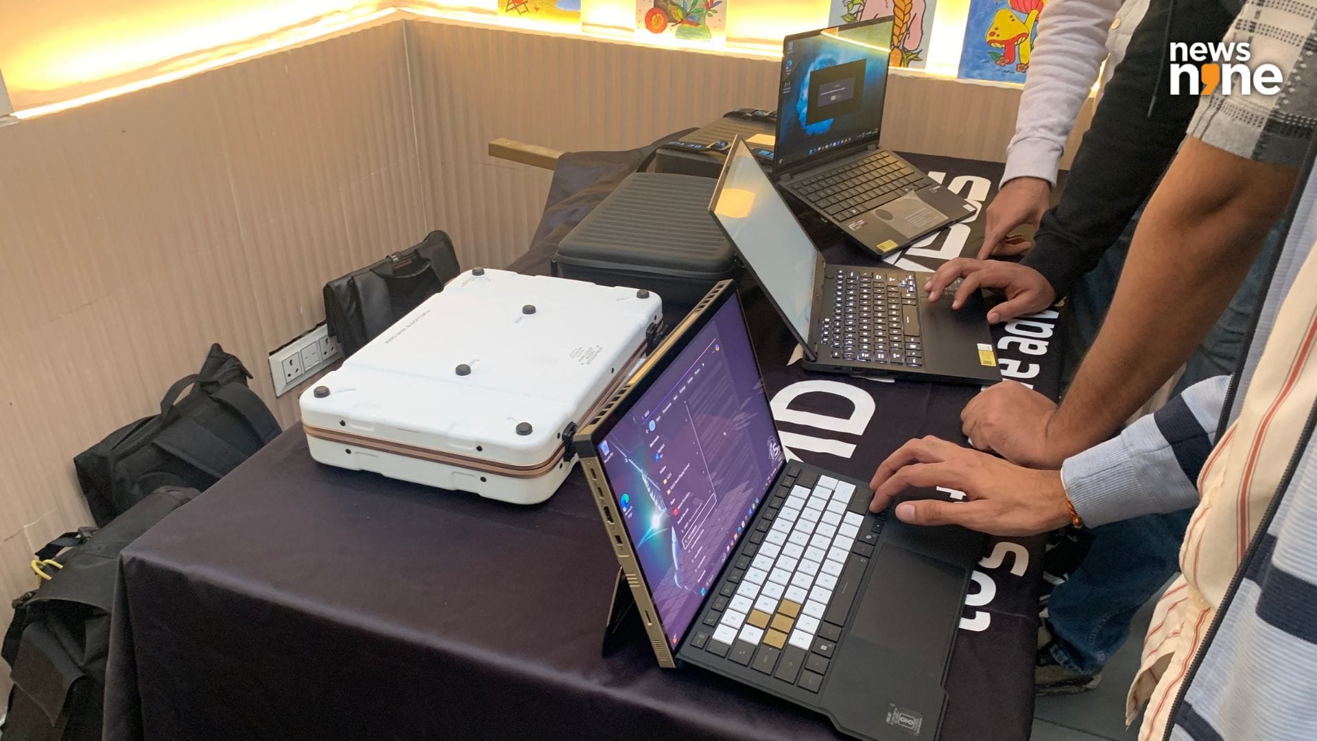 The TUF Gaming A14 is in the middle, flanked by the Kojima Flow on the left and the GoPro ProArt on the right. (Image Credit: Aditya Madanapalle/News9). 